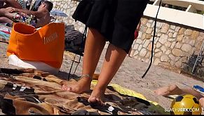 Fuckable MILF tanning on the beach